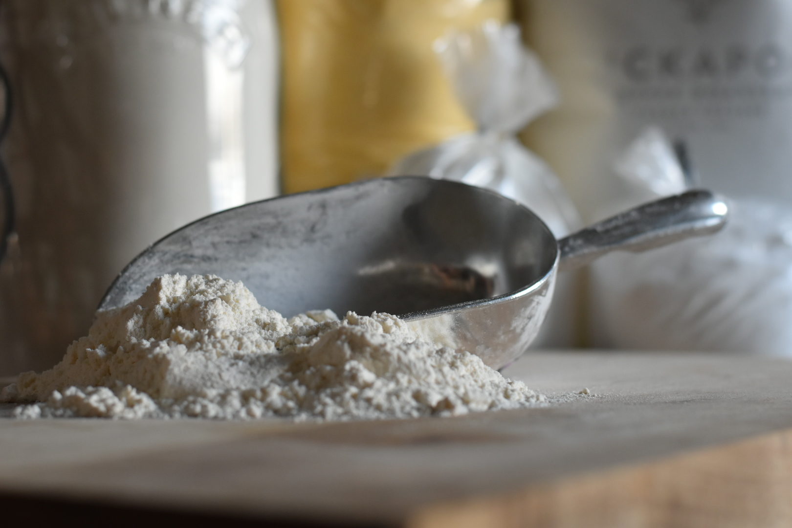 self rising flour in a scoop