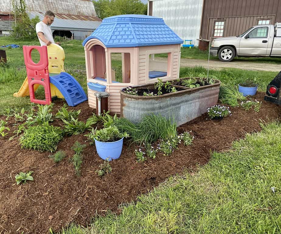 Small herb and flower garden in a raised bed can help prevent overwhelm 